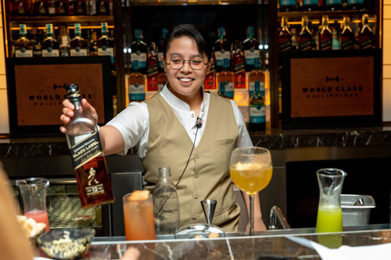 Bar tender with Johnny Walker